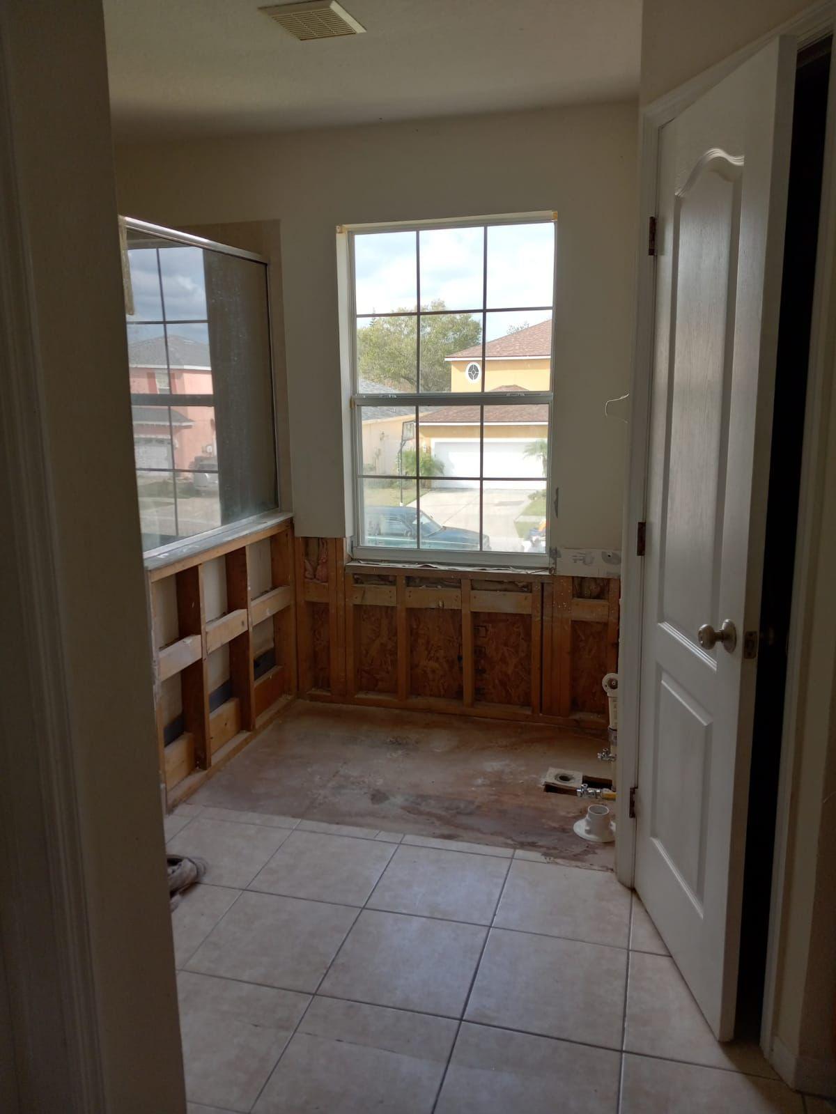 Before: dated bathroom prior to remodeling